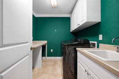 Welcome to this expansive 4-bedroom, 4-bathroom home with over 4 on Haile Plantation Golf and Country Club in Florida - for sale on GolfHomes.com, golf home, golf lot