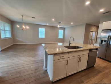 Almost new concrete home w/concrete tile roof in Jensen Beach! on Eagle Marsh Golf Club in Florida - for sale on GolfHomes.com, golf home, golf lot