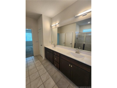 Almost new concrete home w/concrete tile roof in Jensen Beach! on Eagle Marsh Golf Club in Florida - for sale on GolfHomes.com, golf home, golf lot
