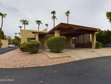 Charming furnished end-unit one-bedroom condo with an open floor on Fountain of the Sun Country Club in Arizona - for sale on GolfHomes.com, golf home, golf lot