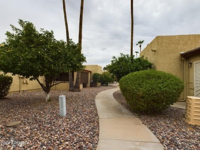 Charming furnished end-unit one-bedroom condo with an open floor on Fountain of the Sun Country Club in Arizona - for sale on GolfHomes.com, golf home, golf lot