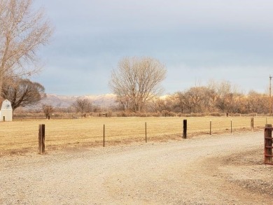 This property offers a remarkable 4.94 acres located on the 1st on Adobe Creek National Golf Course in Colorado - for sale on GolfHomes.com, golf home, golf lot