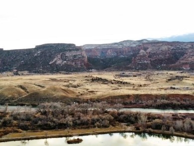 This property offers a remarkable 4.94 acres located on the 1st on Adobe Creek National Golf Course in Colorado - for sale on GolfHomes.com, golf home, golf lot