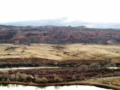 This property offers a remarkable 4.94 acres located on the 1st on Adobe Creek National Golf Course in Colorado - for sale on GolfHomes.com, golf home, golf lot