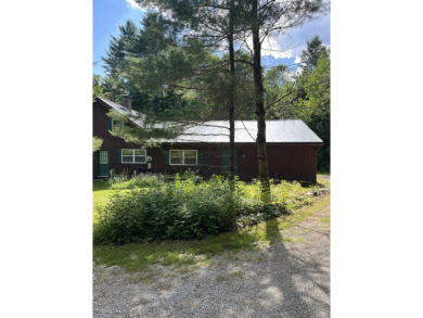 Welcome Home! Located on 10.05 acres, this 4 bedroom, 2 bath on Lake St. Catherine Country Club in Vermont - for sale on GolfHomes.com, golf home, golf lot