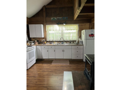 Welcome Home! Located on 10.05 acres, this 4 bedroom, 2 bath on Lake St. Catherine Country Club in Vermont - for sale on GolfHomes.com, golf home, golf lot