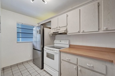 Experience resort-style living in this spacious 2-bedroom on  in Florida - for sale on GolfHomes.com, golf home, golf lot