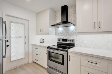 Beautifully renovated 2-bedroom condo sold fully furnished and on Palm-Aire Country Club and Resort - Palms in Florida - for sale on GolfHomes.com, golf home, golf lot