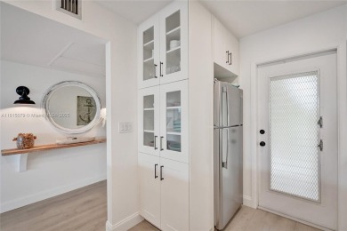 Beautifully renovated 2-bedroom condo sold fully furnished and on Palm-Aire Country Club and Resort - Palms in Florida - for sale on GolfHomes.com, golf home, golf lot