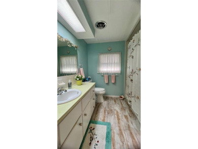 PRICED TO SELL and tucked away in a peaceful location at the on Fairway Village Golf Course in Florida - for sale on GolfHomes.com, golf home, golf lot