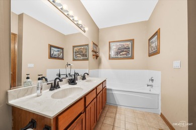 Beautiful end-unit ranch townhome with a finished basement on The Links at Carillon in Illinois - for sale on GolfHomes.com, golf home, golf lot