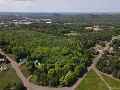Elevated building site with amazing bluff views with City water on Gogebic Country Club in Michigan - for sale on GolfHomes.com, golf home, golf lot