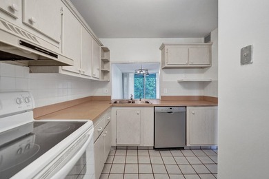 Experience resort-style living in this spacious 2-bedroom on  in Florida - for sale on GolfHomes.com, golf home, golf lot