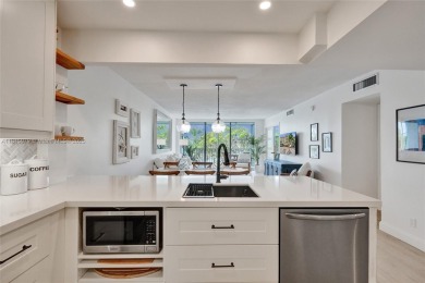 Beautifully renovated 2-bedroom condo sold fully furnished and on Palm-Aire Country Club and Resort - Palms in Florida - for sale on GolfHomes.com, golf home, golf lot