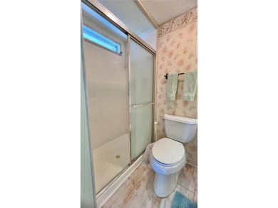 PRICED TO SELL and tucked away in a peaceful location at the on Fairway Village Golf Course in Florida - for sale on GolfHomes.com, golf home, golf lot