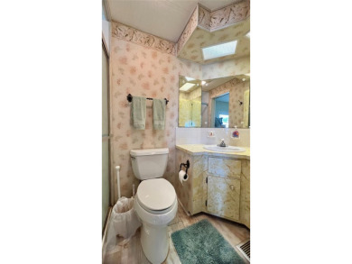 PRICED TO SELL and tucked away in a peaceful location at the on Fairway Village Golf Course in Florida - for sale on GolfHomes.com, golf home, golf lot