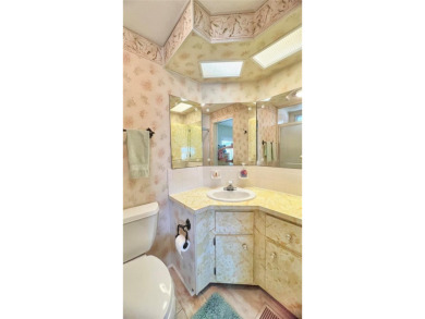 PRICED TO SELL and tucked away in a peaceful location at the on Fairway Village Golf Course in Florida - for sale on GolfHomes.com, golf home, golf lot
