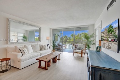 Beautifully renovated 2-bedroom condo sold fully furnished and on Palm-Aire Country Club and Resort - Palms in Florida - for sale on GolfHomes.com, golf home, golf lot
