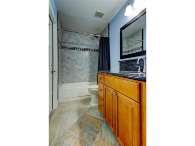 Welcome to this beautifully updated 3-bedroom, 2-bathroom home on Westchase Golf Club in Florida - for sale on GolfHomes.com, golf home, golf lot