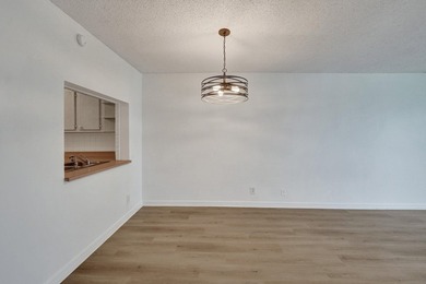 Experience resort-style living in this spacious 2-bedroom on  in Florida - for sale on GolfHomes.com, golf home, golf lot