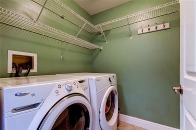 Welcome to this beautifully updated 3-bedroom, 2-bathroom home on Westchase Golf Club in Florida - for sale on GolfHomes.com, golf home, golf lot