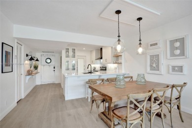 Beautifully renovated 2-bedroom condo sold fully furnished and on Palm-Aire Country Club and Resort - Palms in Florida - for sale on GolfHomes.com, golf home, golf lot