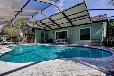 Welcome to this beautifully updated 3-bedroom, 2-bathroom home on Westchase Golf Club in Florida - for sale on GolfHomes.com, golf home, golf lot