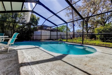 Welcome to this beautifully updated 3-bedroom, 2-bathroom home on Westchase Golf Club in Florida - for sale on GolfHomes.com, golf home, golf lot