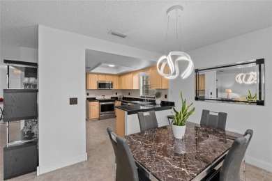 Price Improvement!  Fully updated!  Bring your golf clubs and on East Lake Woodlands Country Club in Florida - for sale on GolfHomes.com, golf home, golf lot