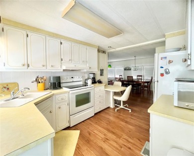PRICED TO SELL and tucked away in a peaceful location at the on Fairway Village Golf Course in Florida - for sale on GolfHomes.com, golf home, golf lot
