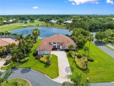 Enjoy natural light and serene views overlooking the lake, pool on Pipers Landing Country Club in Florida - for sale on GolfHomes.com, golf home, golf lot