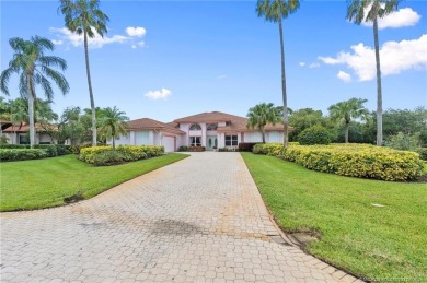 Enjoy natural light and serene views overlooking the lake, pool on Pipers Landing Country Club in Florida - for sale on GolfHomes.com, golf home, golf lot