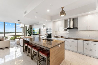 FULLY FURNISHED designer residence at Water Club with on Lost Tree Club in Florida - for sale on GolfHomes.com, golf home, golf lot