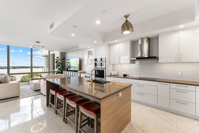 FULLY FURNISHED designer residence at Water Club with on Lost Tree Club in Florida - for sale on GolfHomes.com, golf home, golf lot