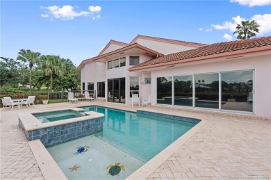 Enjoy natural light and serene views overlooking the lake, pool on Pipers Landing Country Club in Florida - for sale on GolfHomes.com, golf home, golf lot