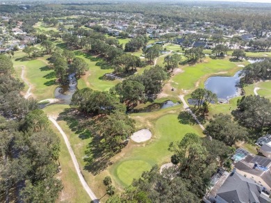 Welcome to this beautifully updated 3-bedroom, 2-bathroom home on Westchase Golf Club in Florida - for sale on GolfHomes.com, golf home, golf lot