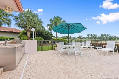 Enjoy natural light and serene views overlooking the lake, pool on Pipers Landing Country Club in Florida - for sale on GolfHomes.com, golf home, golf lot