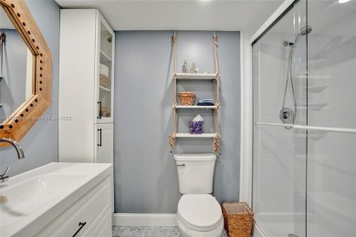 Beautifully renovated 2-bedroom condo sold fully furnished and on Palm-Aire Country Club and Resort - Palms in Florida - for sale on GolfHomes.com, golf home, golf lot