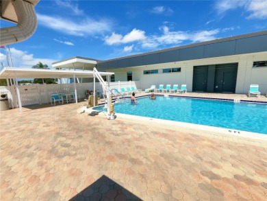 Under contract-accepting backup offers. PRICED TO SELL and on Fairway Village Golf Course in Florida - for sale on GolfHomes.com, golf home, golf lot