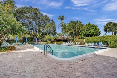 Beautifully renovated 2-bedroom condo sold fully furnished and on Palm-Aire Country Club and Resort - Palms in Florida - for sale on GolfHomes.com, golf home, golf lot