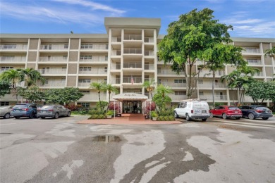 Beautifully renovated 2-bedroom condo sold fully furnished and on Palm-Aire Country Club and Resort - Palms in Florida - for sale on GolfHomes.com, golf home, golf lot