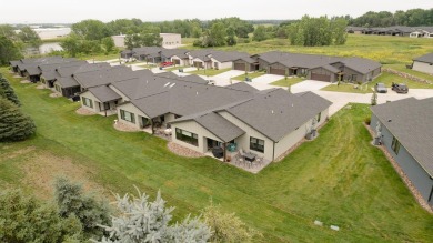 This end unit in The Dwellings has all the upgrades! One owner on Indian Hills Golf Club in Iowa - for sale on GolfHomes.com, golf home, golf lot