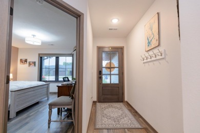 This end unit in The Dwellings has all the upgrades! One owner on Indian Hills Golf Club in Iowa - for sale on GolfHomes.com, golf home, golf lot