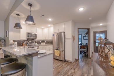 This end unit in The Dwellings has all the upgrades! One owner on Indian Hills Golf Club in Iowa - for sale on GolfHomes.com, golf home, golf lot