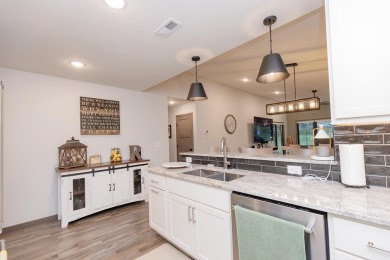This end unit in The Dwellings has all the upgrades! One owner on Indian Hills Golf Club in Iowa - for sale on GolfHomes.com, golf home, golf lot