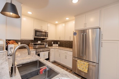 This end unit in The Dwellings has all the upgrades! One owner on Indian Hills Golf Club in Iowa - for sale on GolfHomes.com, golf home, golf lot