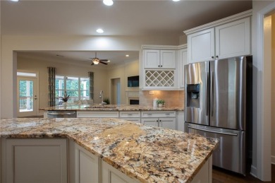 Tucked away on a wooded lot in Cresswind at Lake Lanier, a on Lanier Island Legacy Golf Couorse in Georgia - for sale on GolfHomes.com, golf home, golf lot