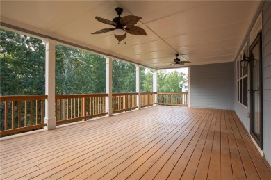 Tucked away on a wooded lot in Cresswind at Lake Lanier, a on Lanier Island Legacy Golf Couorse in Georgia - for sale on GolfHomes.com, golf home, golf lot