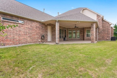 A beautiful custom-built home with golf course views! As you on Pecan Hollow Golf Course in Texas - for sale on GolfHomes.com, golf home, golf lot