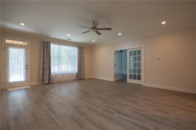 Tucked away on a wooded lot in Cresswind at Lake Lanier, a on Lanier Island Legacy Golf Couorse in Georgia - for sale on GolfHomes.com, golf home, golf lot